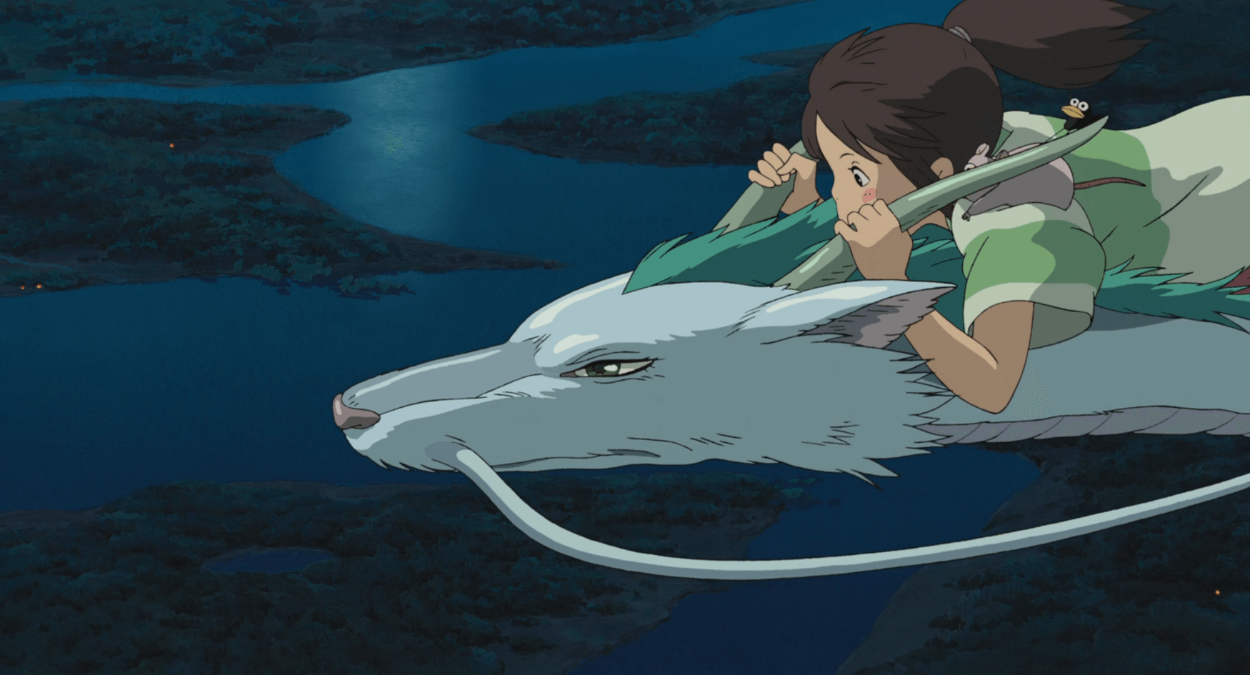 Dragon Haku and Chihiro soar over rural Japan